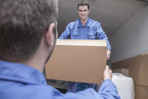 Removal van and movers working on a same-day move in St Johns Wood