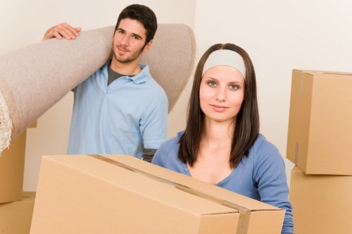 Careful lifting of a sofa and household furniture in St Johns Wood